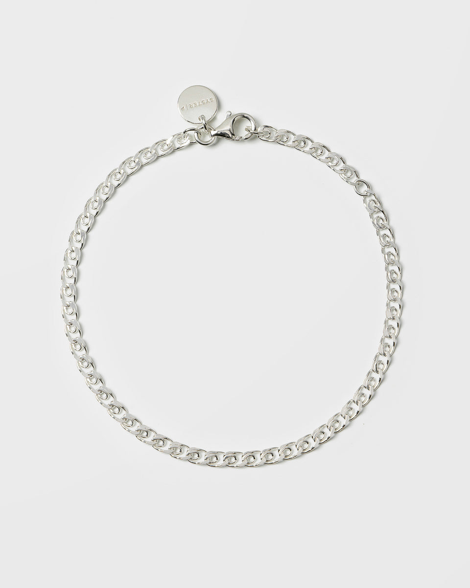 A product shot of the Sheer Love Bracelet in silver, laid out in a circle to display its unique patterned chain.