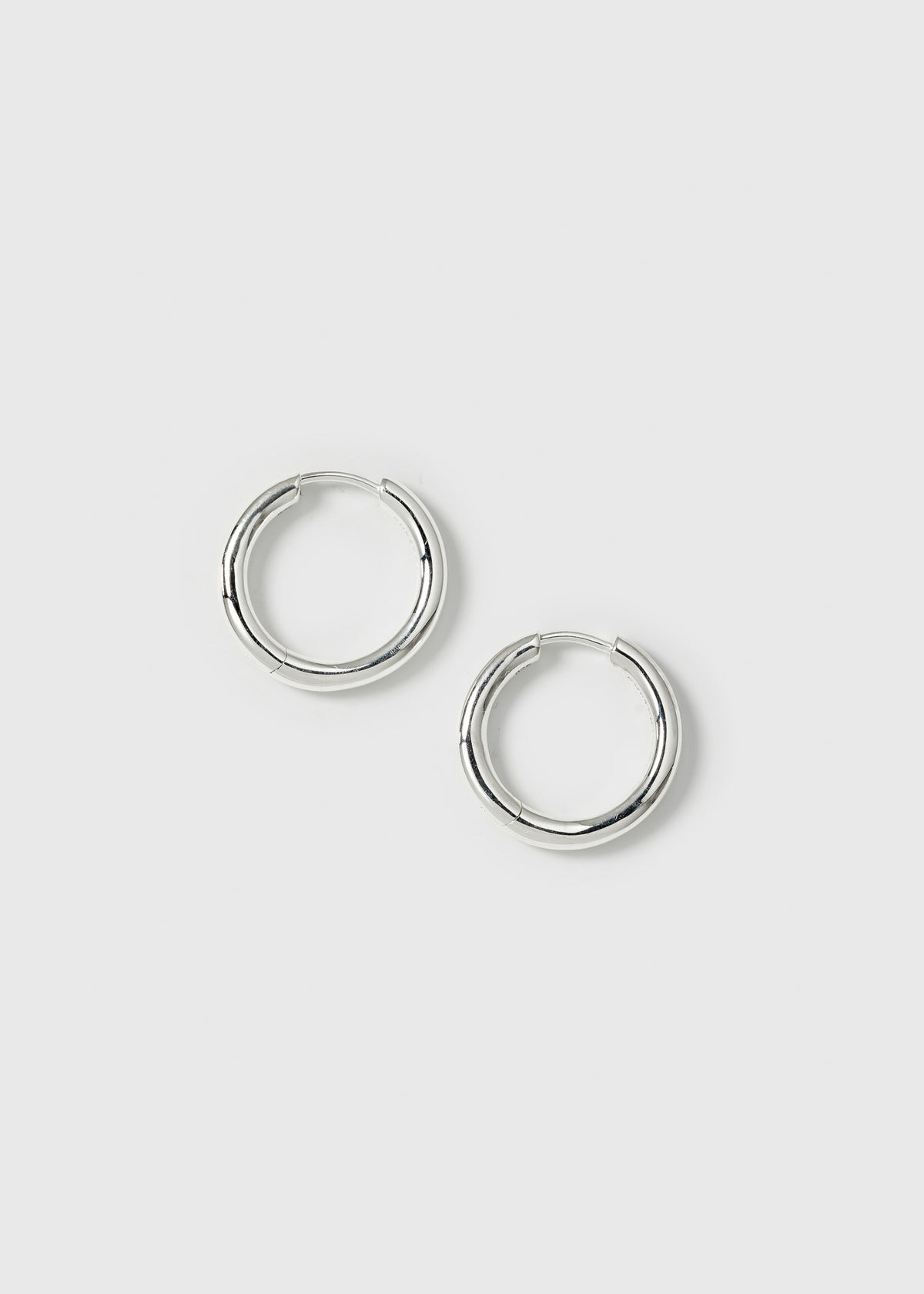 A product shot of the Beloved Fat Big Hoops in silver, showcasing their classic and chunky design.