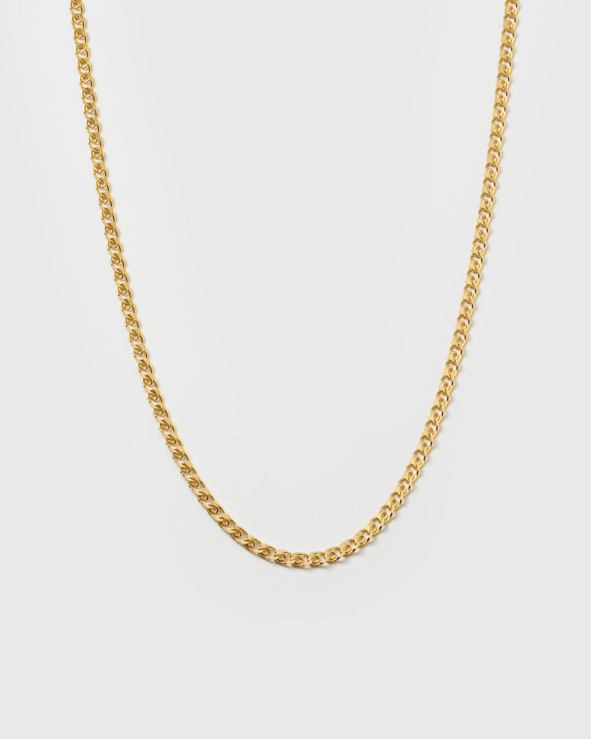 A product shot of the Sheer Love Necklace in gold, featuring its distinctive patterned chain.