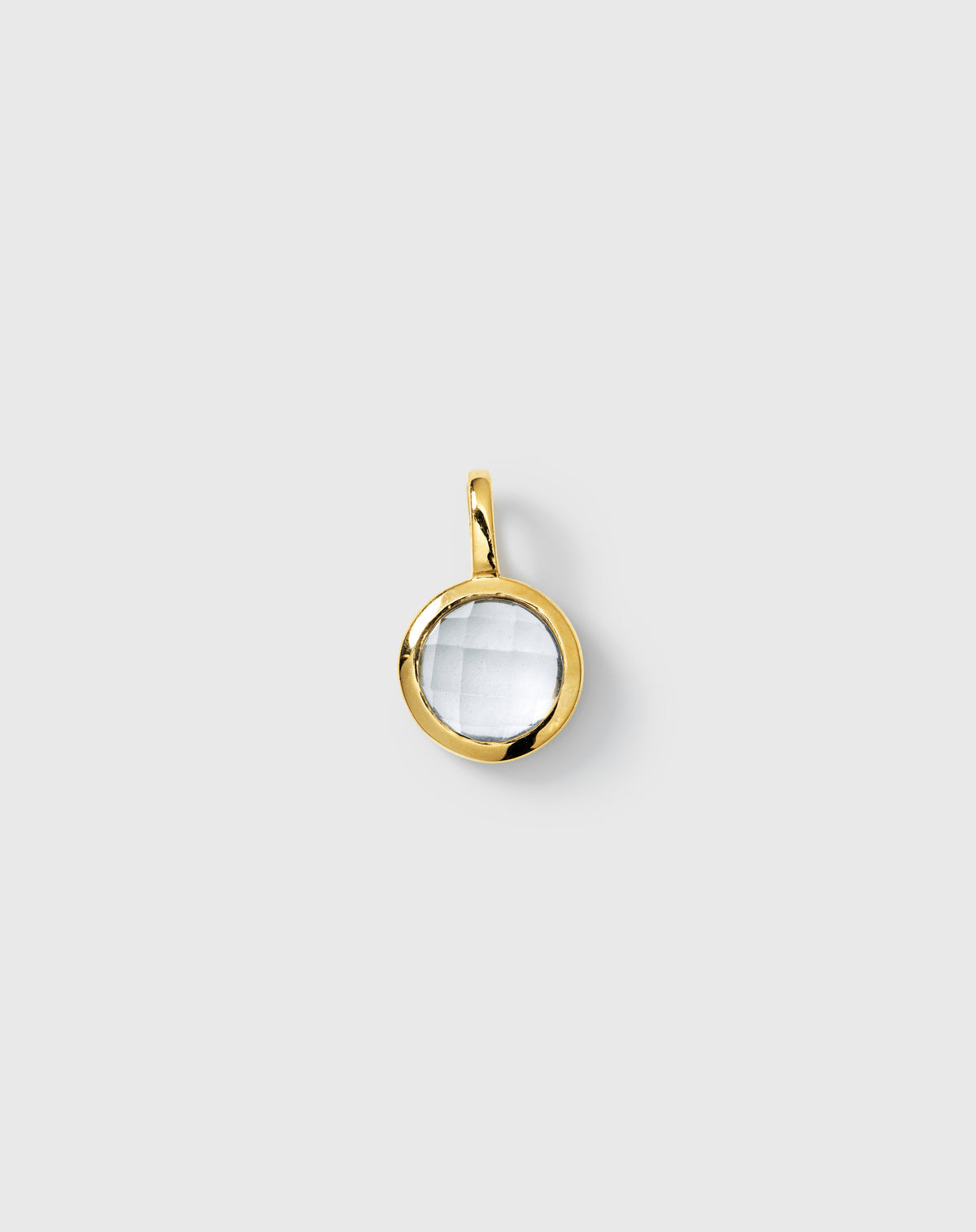 Gold pendant featuring a round faceted aquamarine, March birthstone.