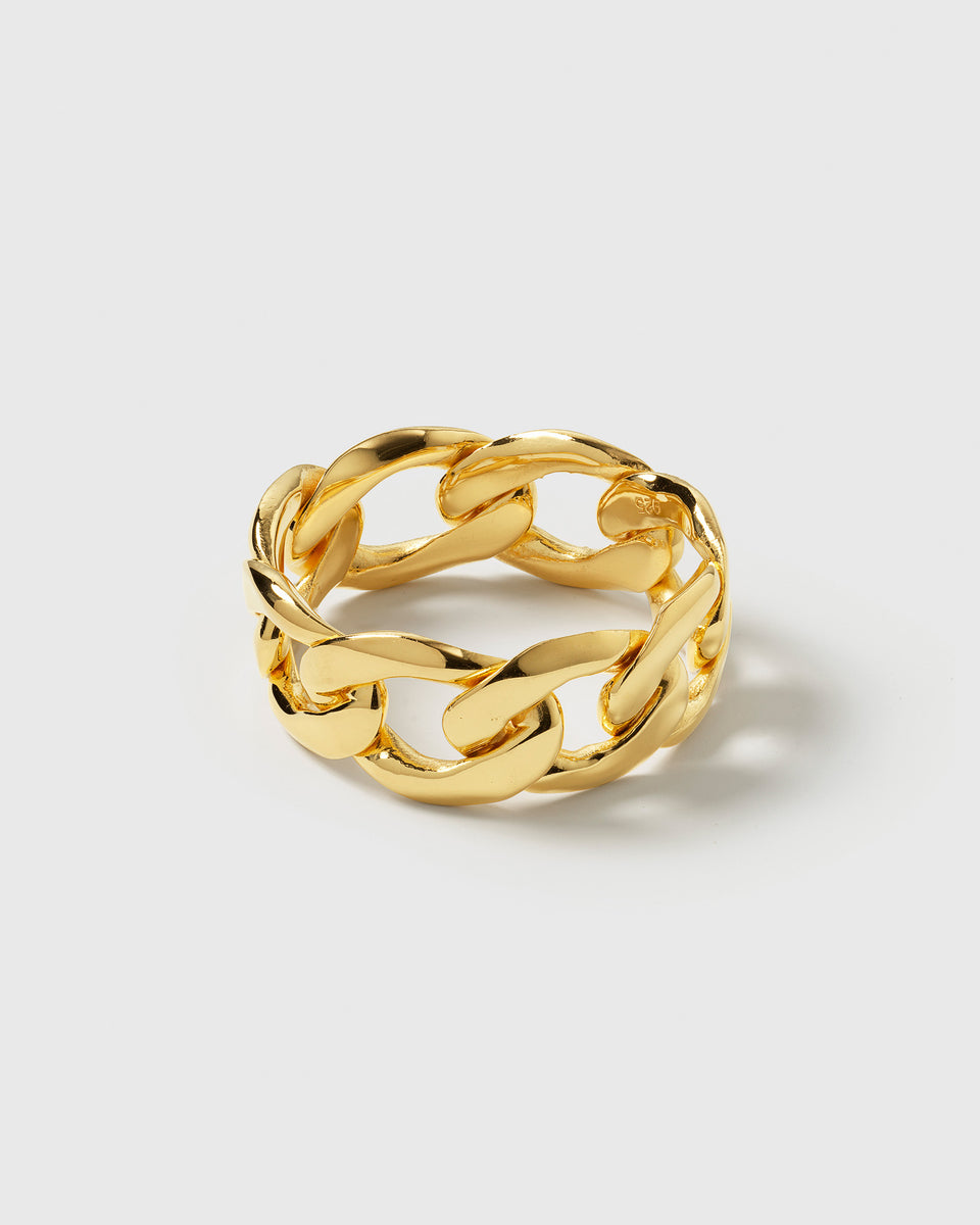 A product shot of the Links Ring in gold, displaying its curb chain design with a flattened surface.