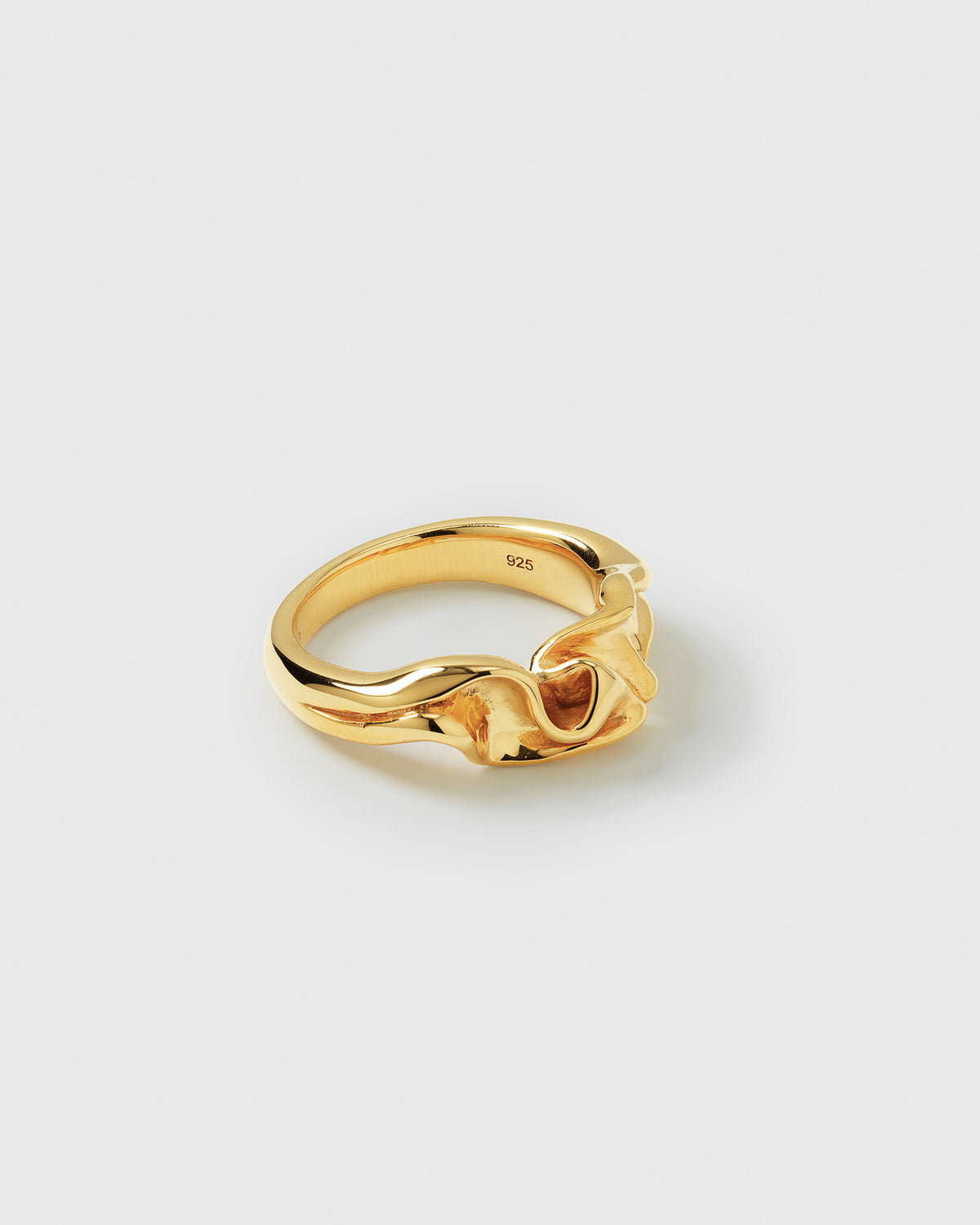 A product shot of the Moulded Narrow Ring in gold, showcasing its unique and irregular shape with an organic texture.