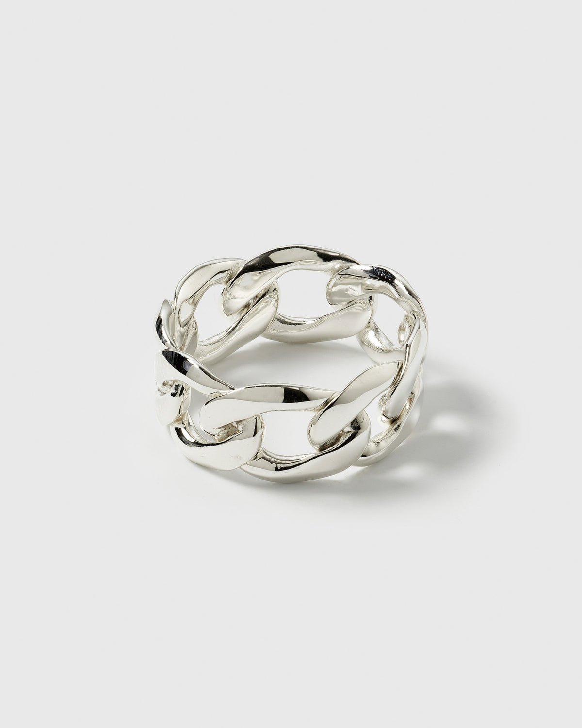 A product shot of the Links Ring in silver, showcasing its bold design of interconnected, flattened curb chain links.