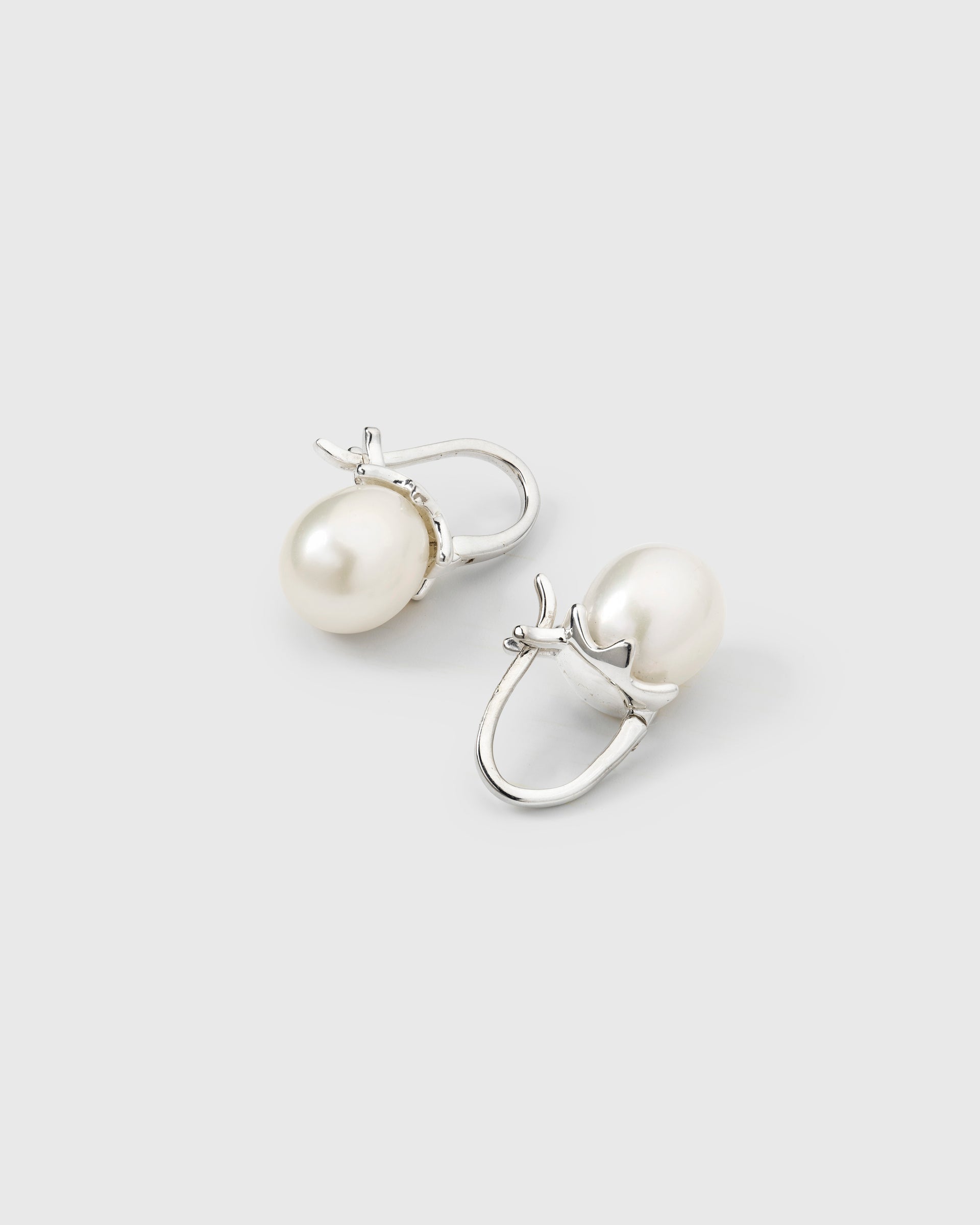 Sterling silver earrings with freshwater pearls.