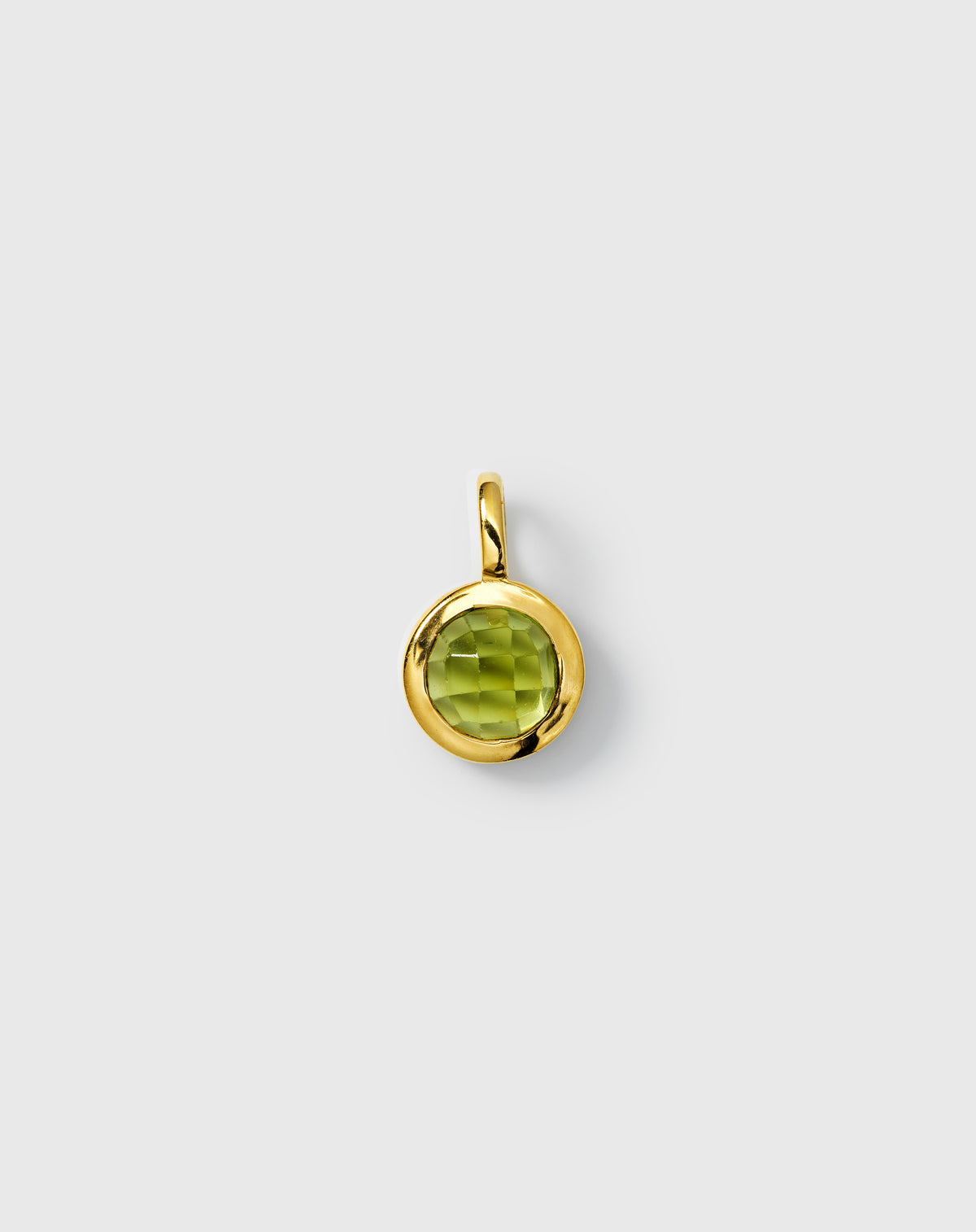 August birthstone gold pendant with round faceted green peridot.