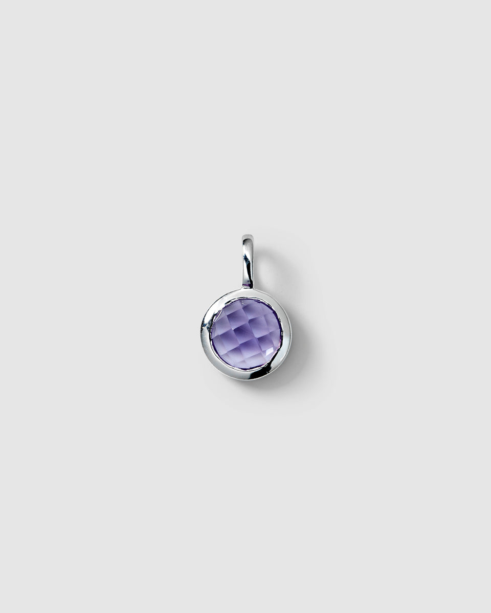 Silver pendant featuring a round faceted amethyst, February birthstone.