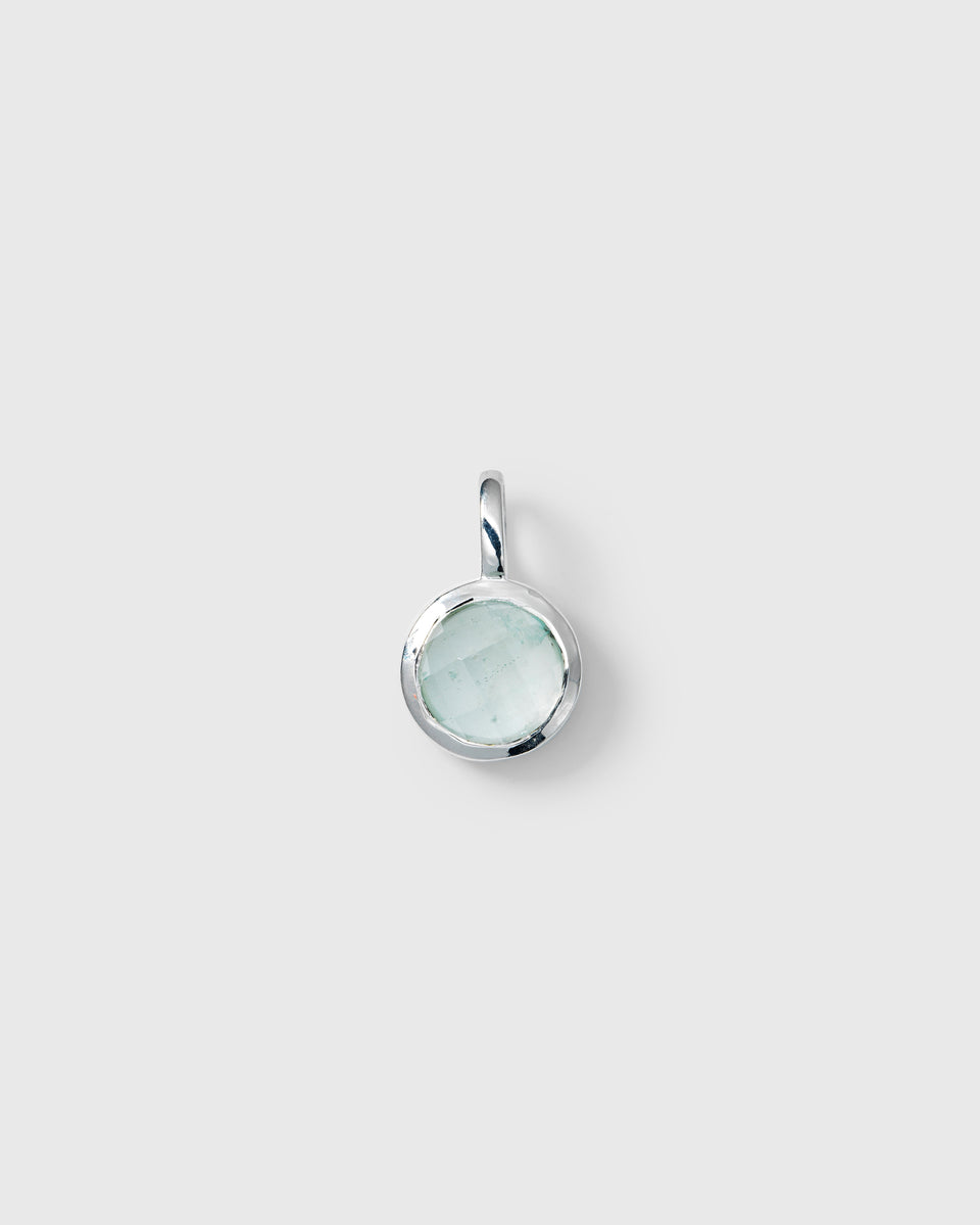 Silver pendant featuring a round moonstone, June birthstone.