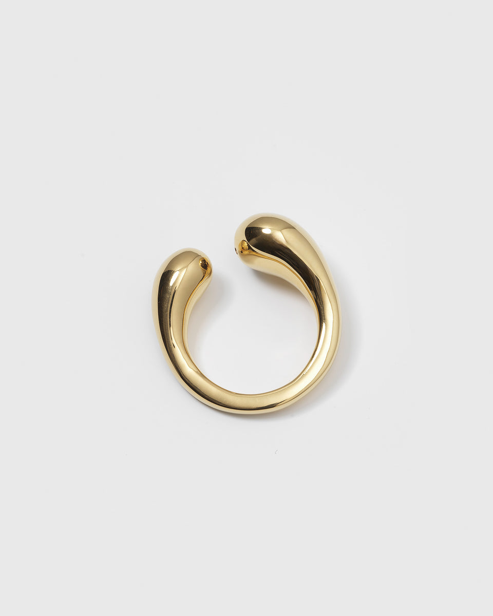 A product shot of the Bolded Drops Ring in gold, featuring its bold, open design with two smooth, drop-shaped ends.