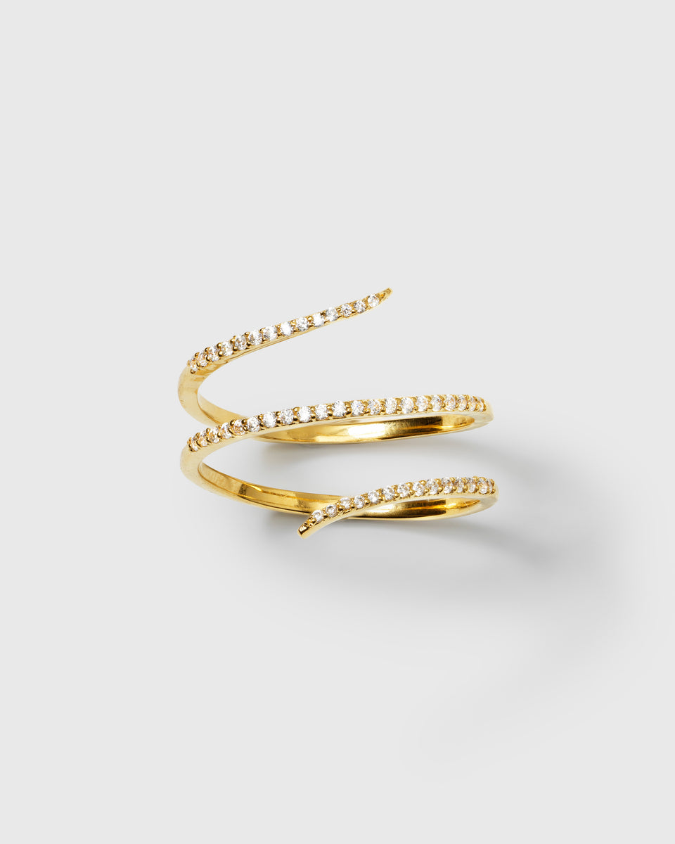 A product shot of the Sparkle Wrap Ring in gold, displaying its elegant spiral design set with shimmering cubic zirconia stones.
