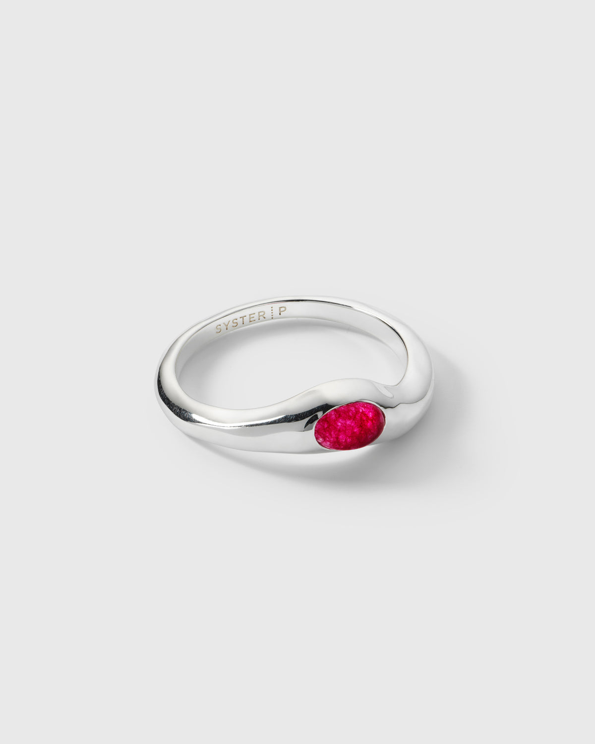 A product shot of the Florentina Oval Stone Ring in silver, featuring a wavy band and a set oval pink quartz stone.