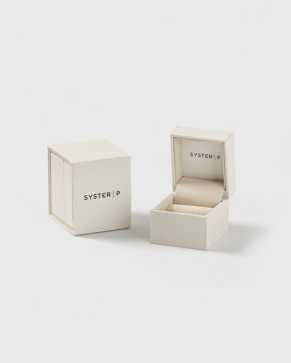 The Moulded Narrow Ring Gold comes in an exclusive Syster P jewelry box, shown here both open and closed.