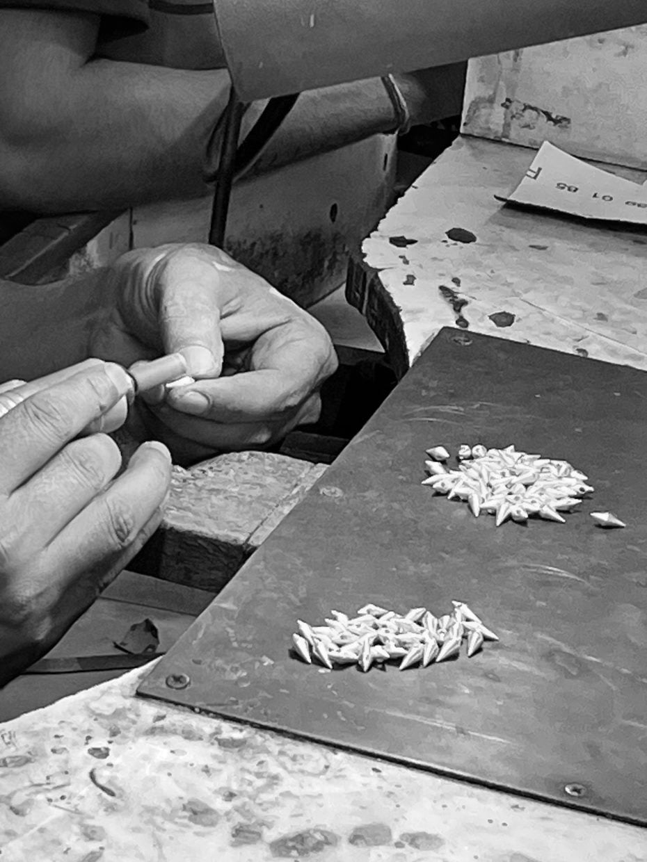 The spike is being prepared for mounting in our factory. All our jewelry is made from 100% recycled sterling silver.